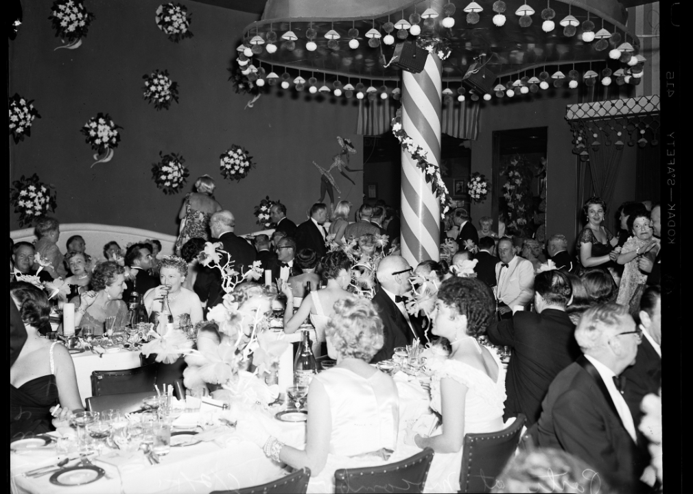 Guests dine at multiple tables in the main room of the Mocambo.