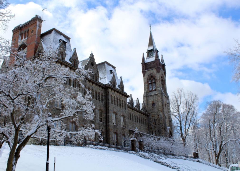 A historic gothic building in snow at Lehigh University.