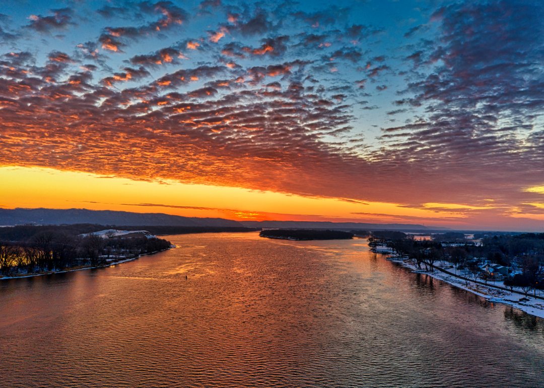 A sunset over a river. 