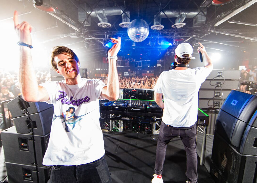 The Chainsmokers performing onstage.