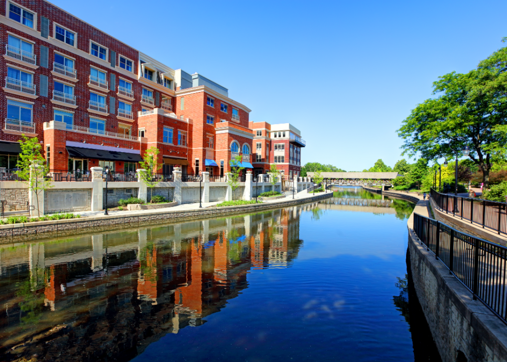 A waterway and commercial buildings in Naperville, Illinois.