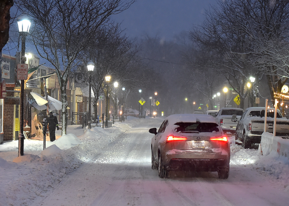 A snowy small downtown street.