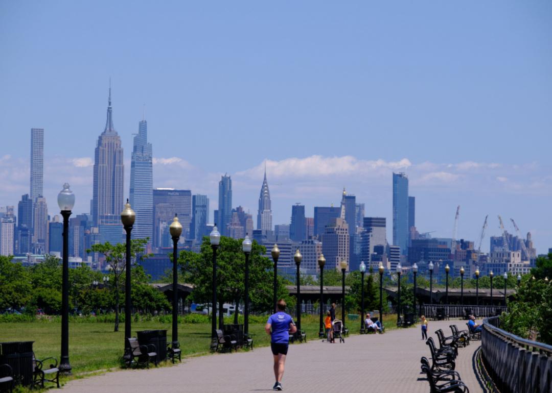A man jogging at a park in Jersey City.