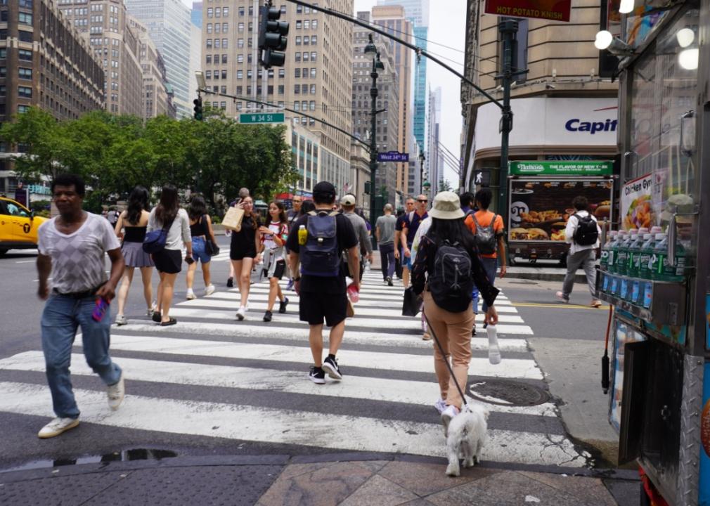 Pedestrians Crossing Street in Midtown Manhattan.