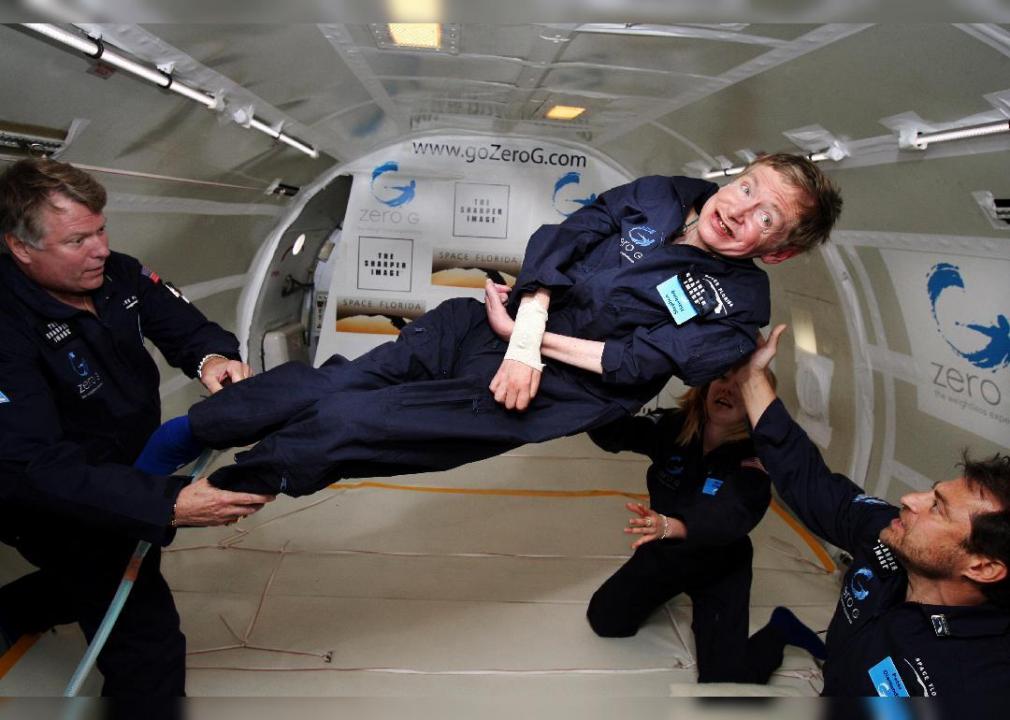 Stephen Hawking (center) enjoys zero gravity during a flight aboard a modified Boeing 727 aircraft.