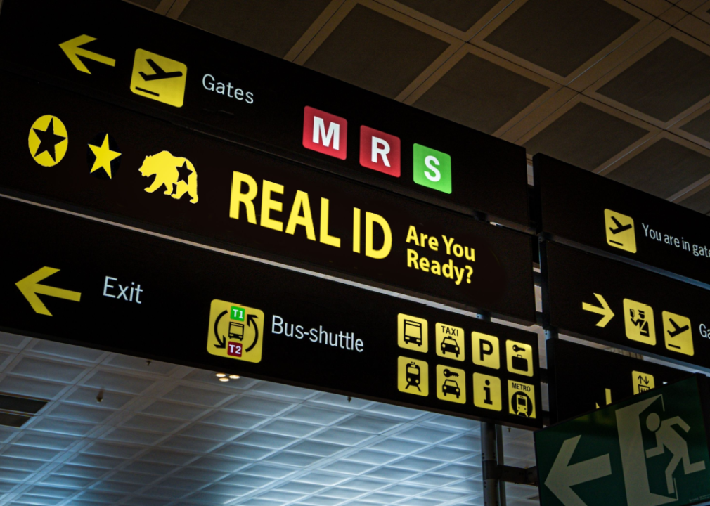 Illuminated airport signage displaying the Real ID compliance to remind airport visitors about new travel document requirements.