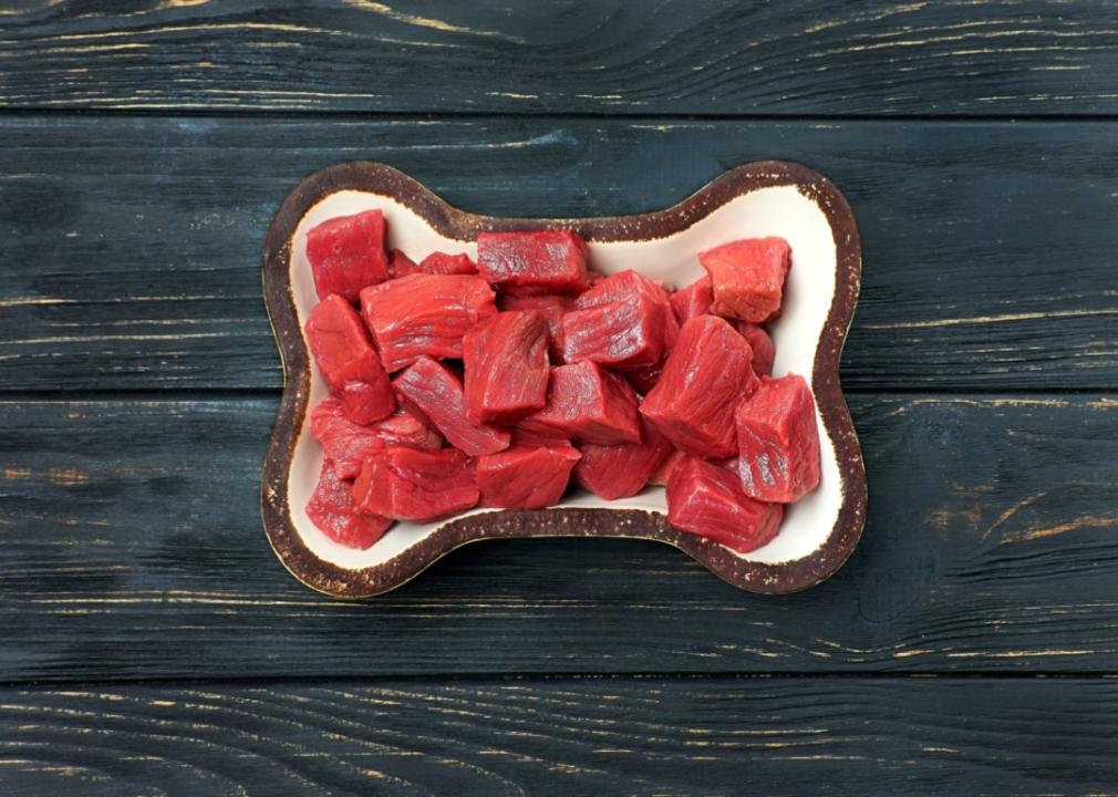 Raw meat in a dog bowl.