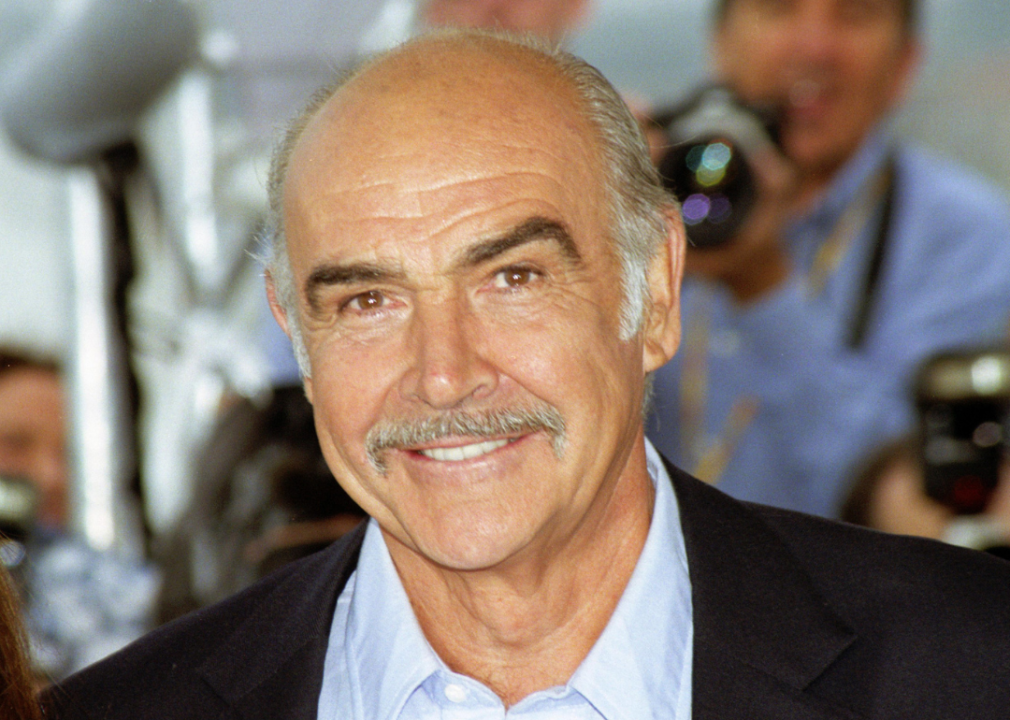 Sean Connery smiles at event.