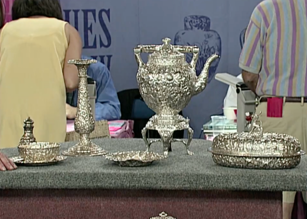A silver service and dresser set as seen on The Antiques Roadshow.