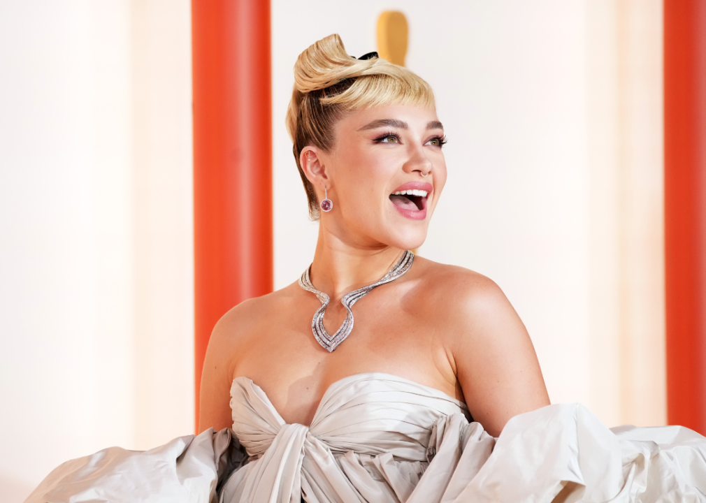 Florence Pugh in a beige strapless gown.