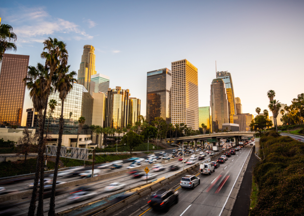 Busy highway traffic and skyline of Los Angeles.