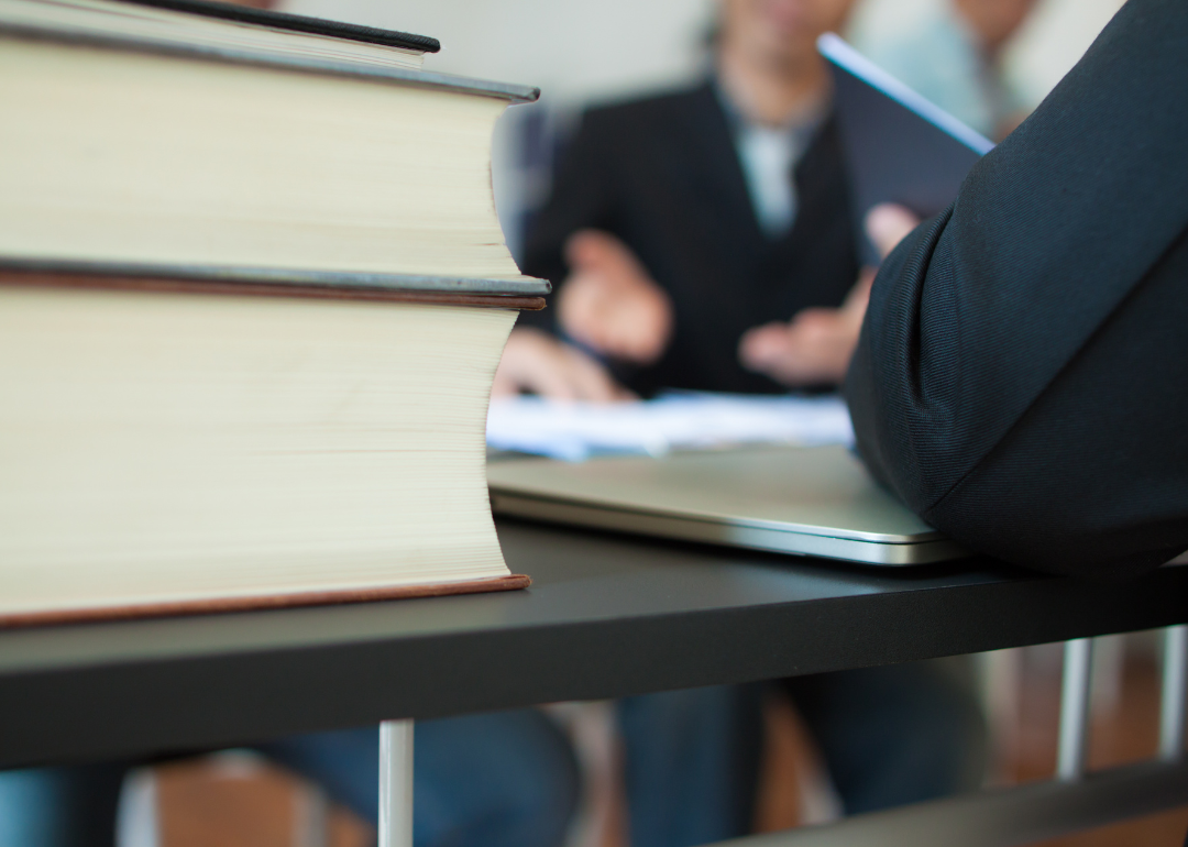 A businessperson meeting with legal counsel.