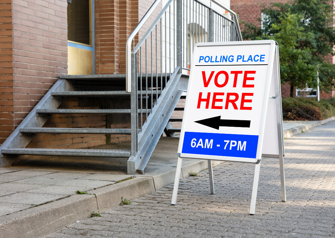 A "Vote Here" sign at a polling place