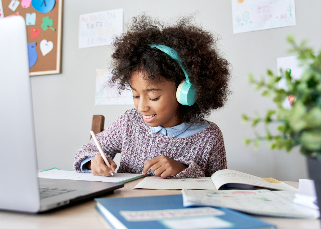 A student on their laptop attending virtual class.