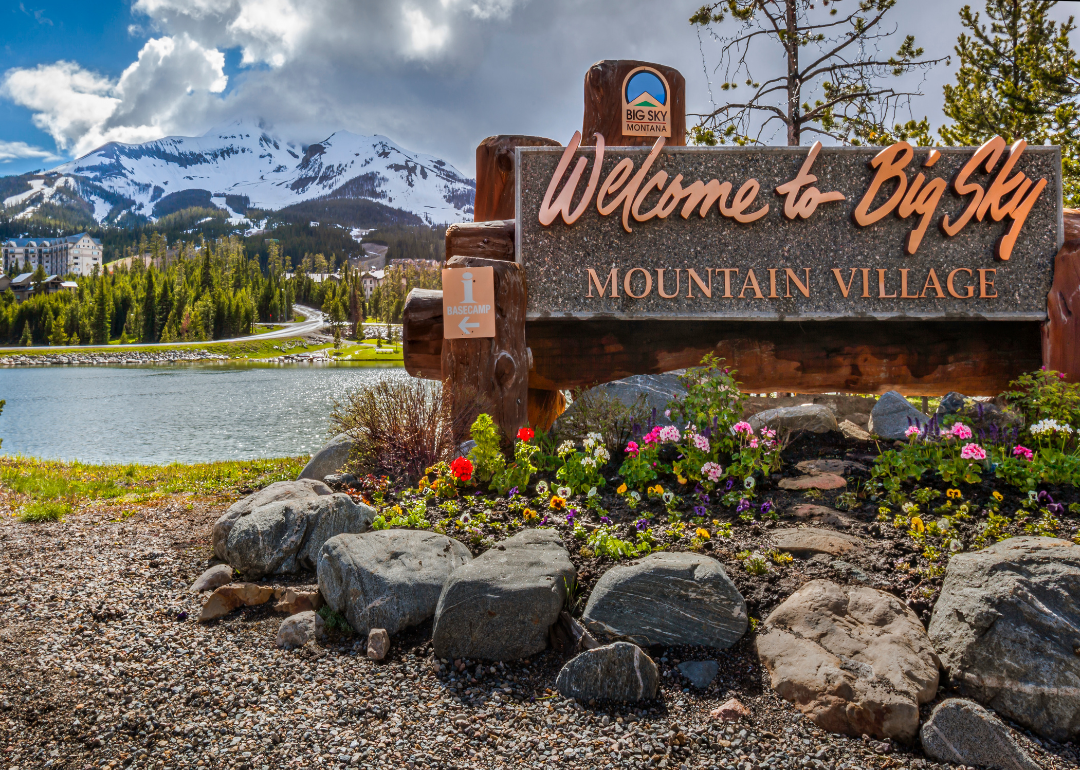 A Welcome to Big Sky Mountain Village sign.