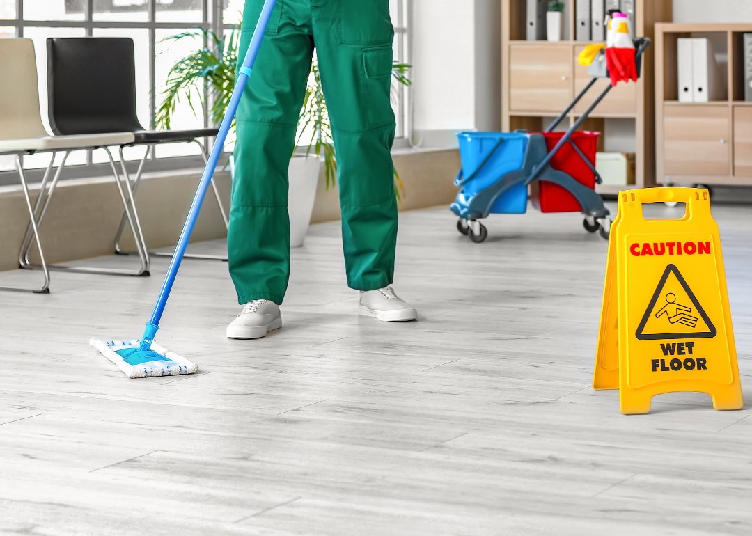 Janitor mopping a floor