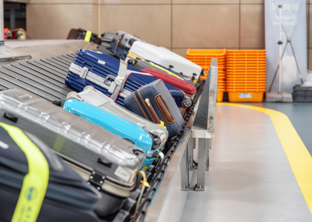 Suitcases on an airport's luggage conveyor belt