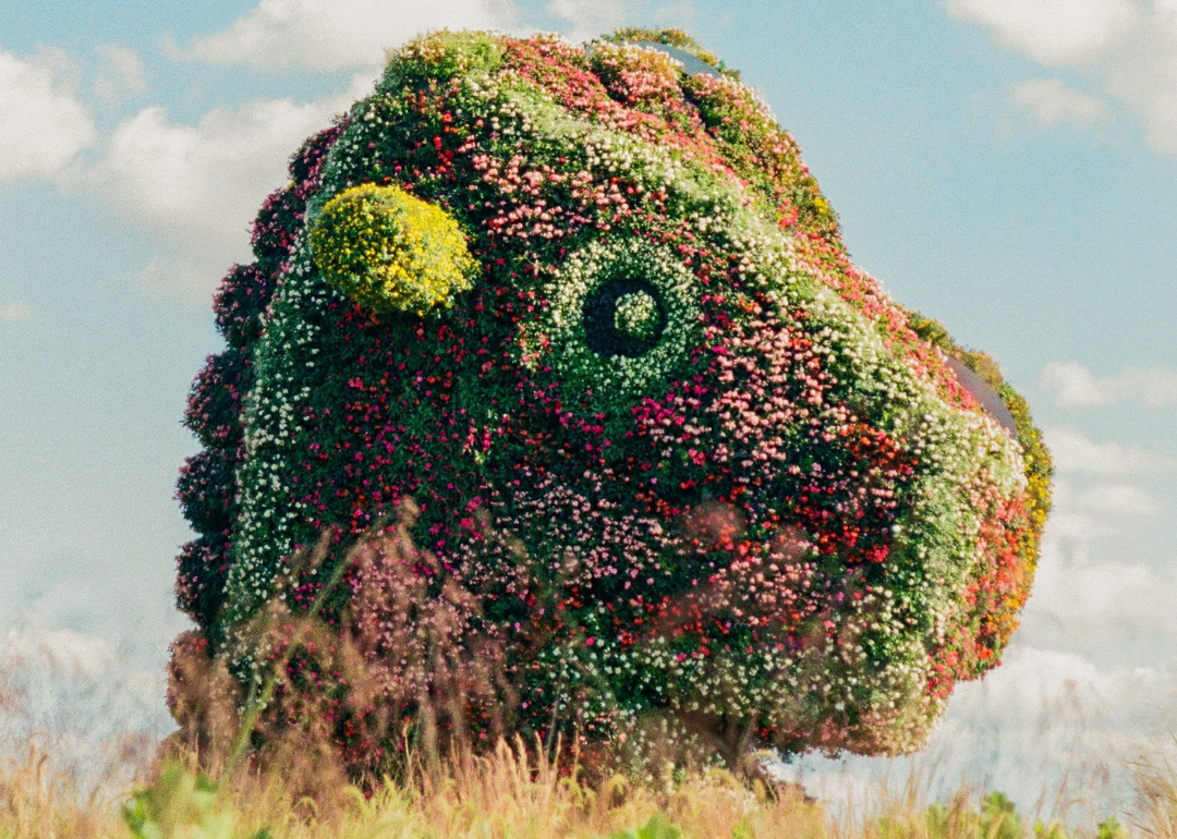 Flower-covered Split-Rocker statue by Jeff Koons at Glenstone Museum.