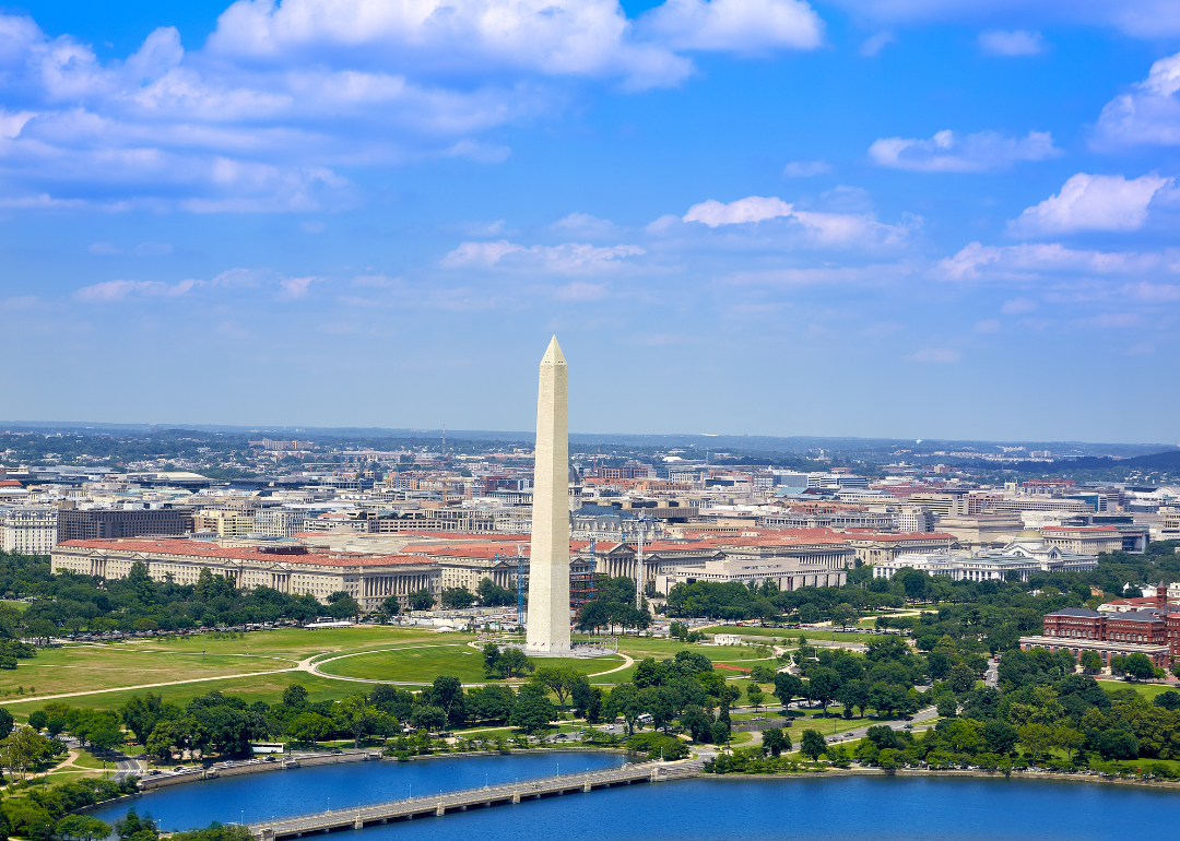 An aerial view of Washington DC, centered on the Washington Monument.