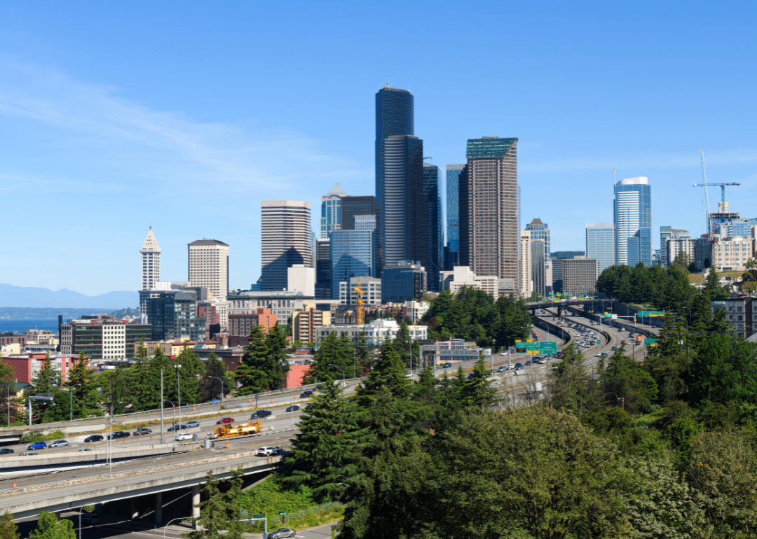The Seattle skyline with Interstate 5 in the foreground.