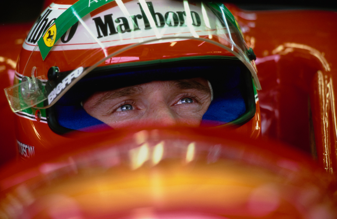 Eddie Irvine looking out from the cockpit of the #2 Scuderia Ferrari F310 Ferrari V10 during practice for the Formula One Argentinian Grand Prix on April 16,1996, at the Autodromo Oscar Alfredo Galvez in Buenos Aires.