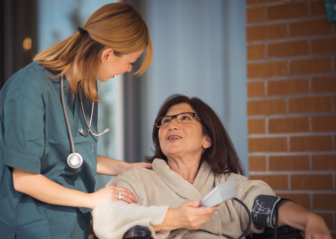 A doctor providing health care services at a patient's home.