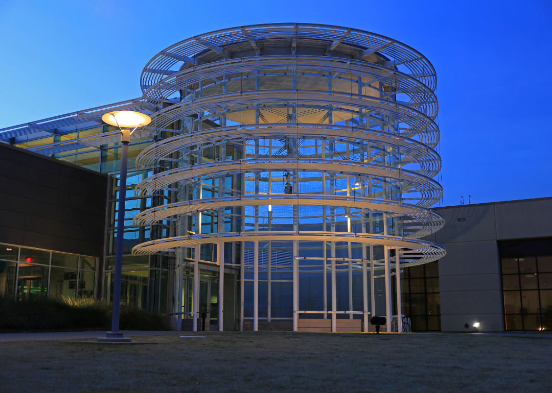 The UT Dallas Visitor Center as seen at night.