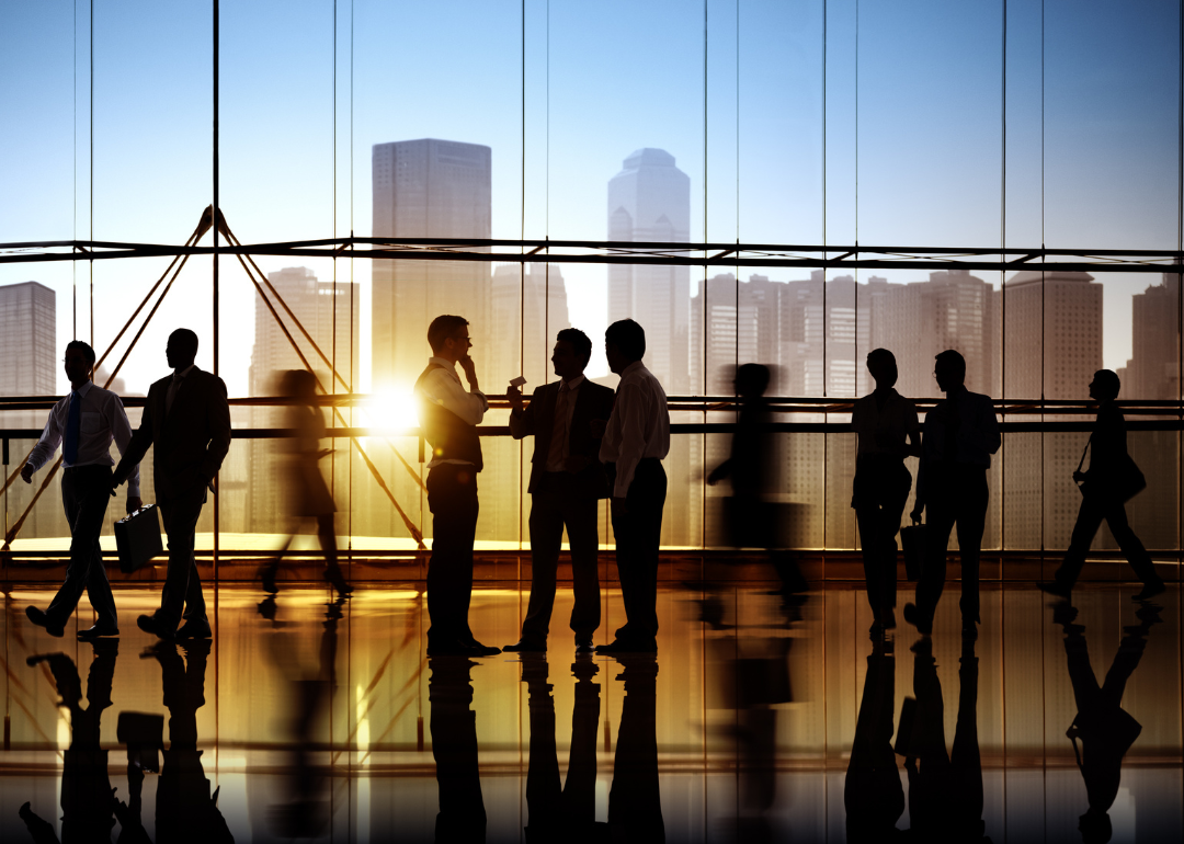 A group of business people in an office space.