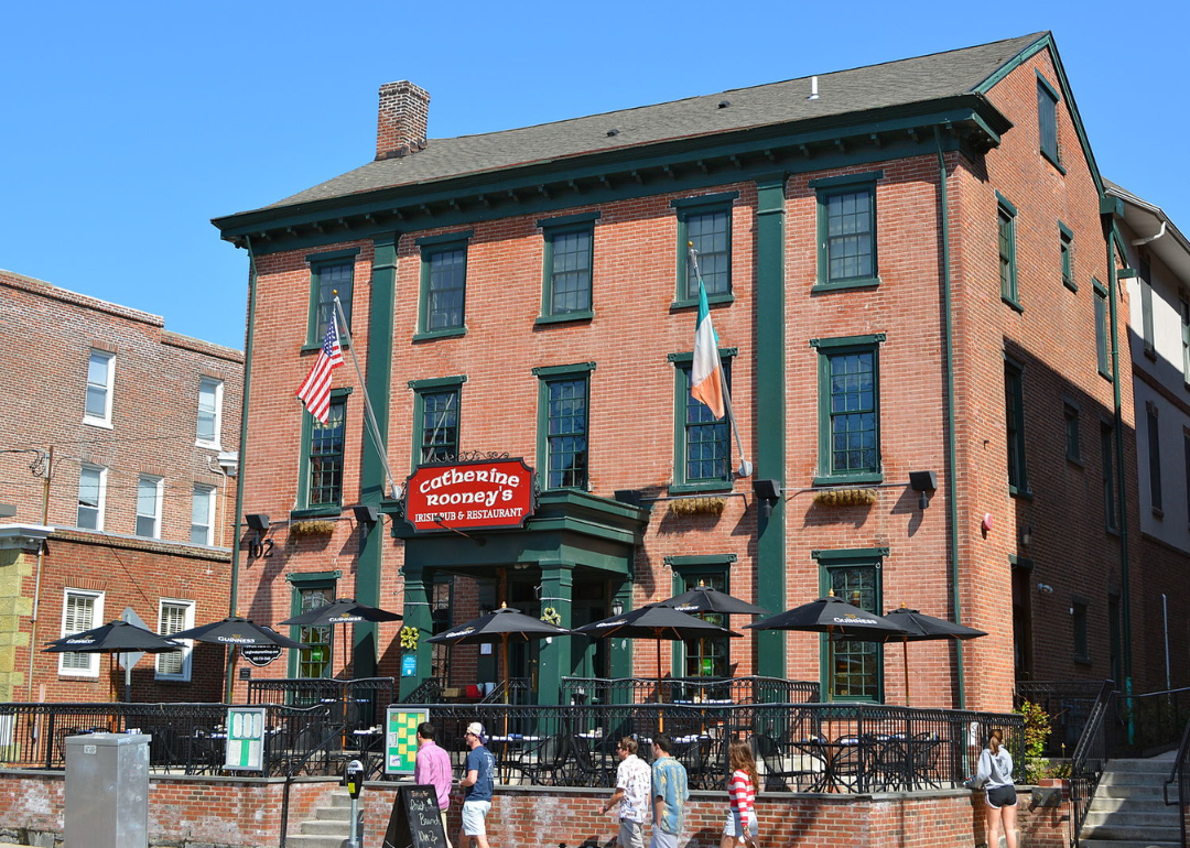 People outside a building in Newark, Delaware, near the University of Delaware.