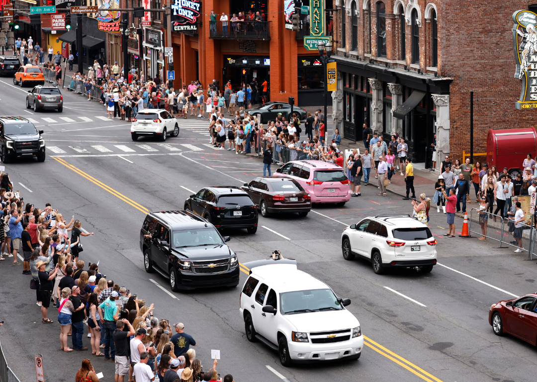 People lining a street in Nashville, Tennessee.