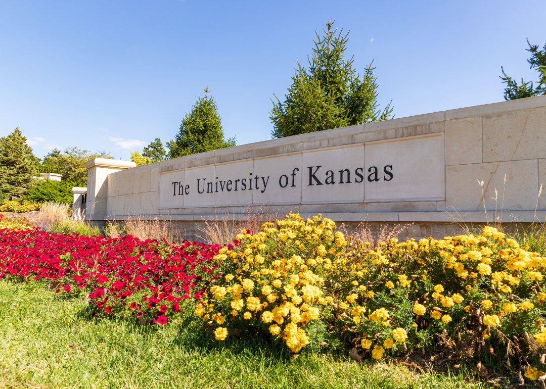 An entrance sign to The University of Kansas.