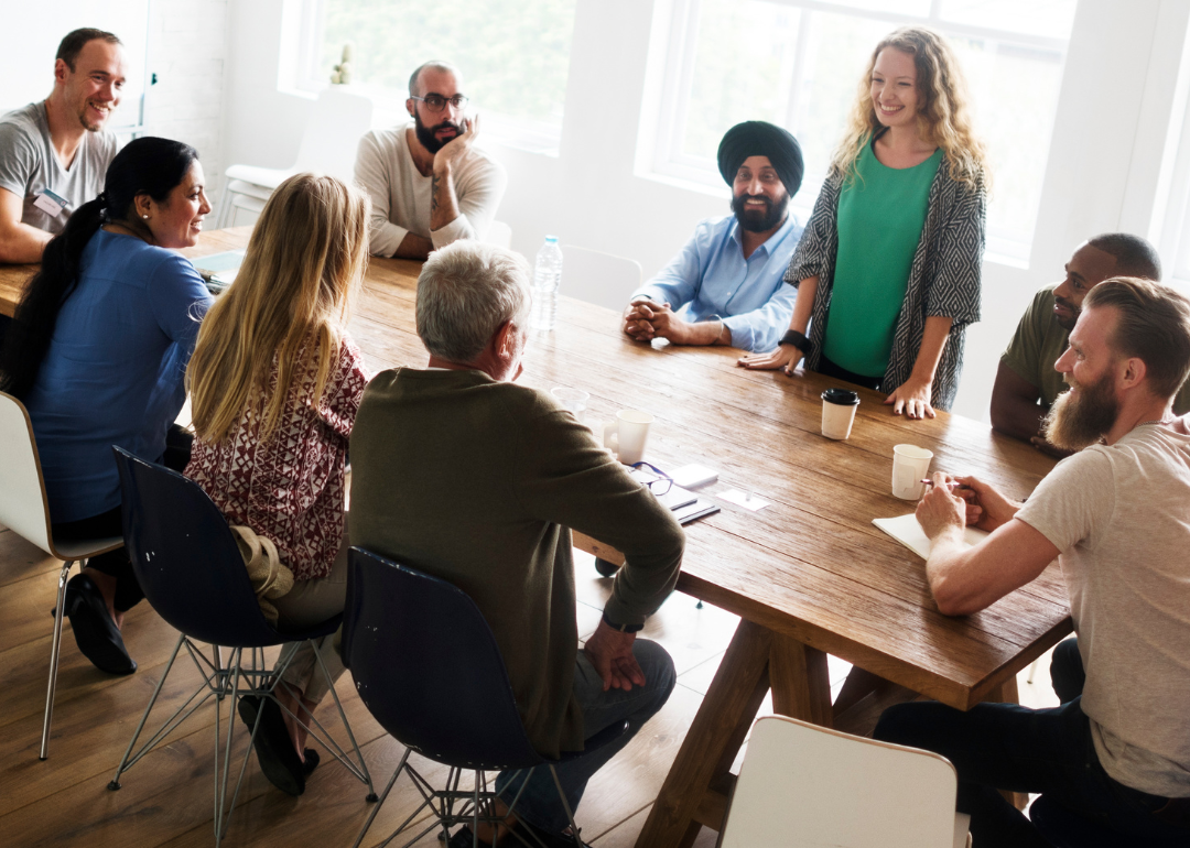 Professionals networking in a coworking space.