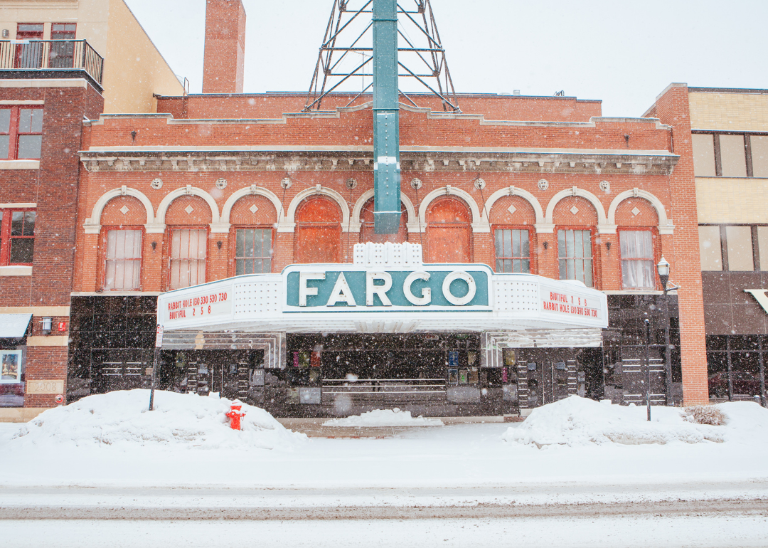 A movie theater covered in snow in downtown Fargo.