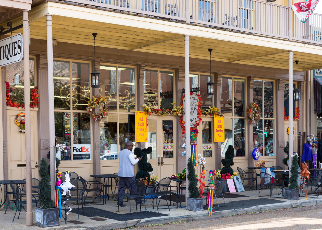 A person and their shop on Main Street in Natchez, Mississippi.