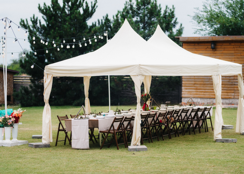 An outdoor wedding reception on flat ground