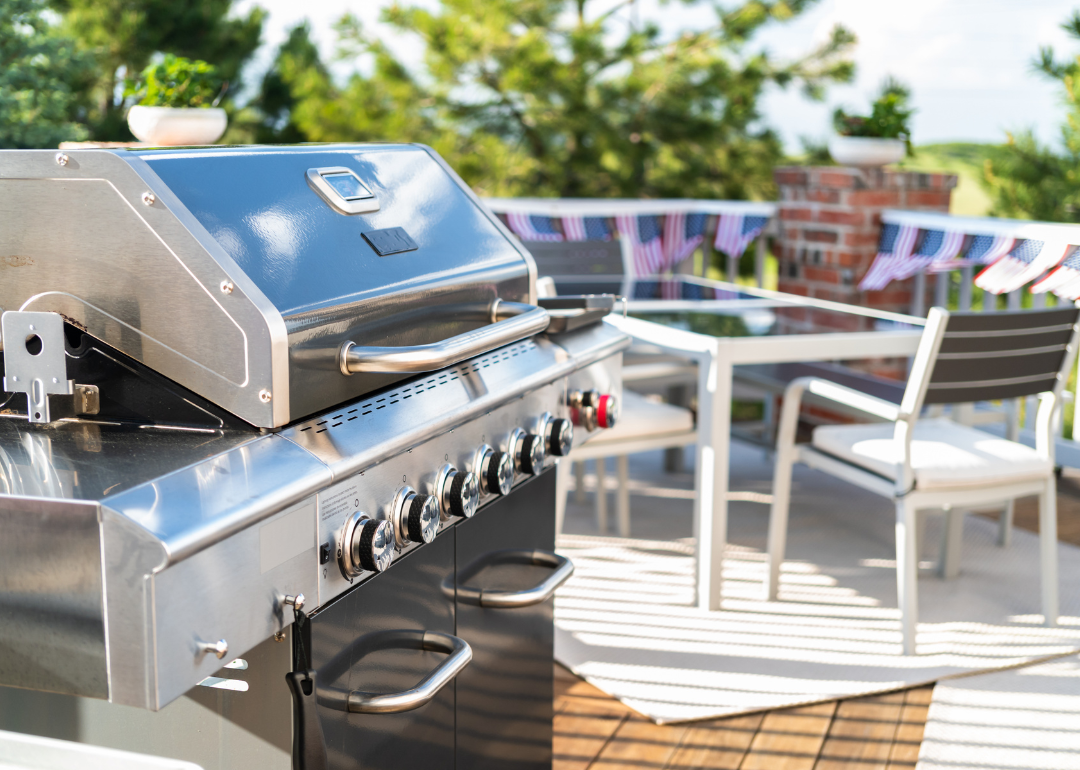 An outdoor grill with storage space