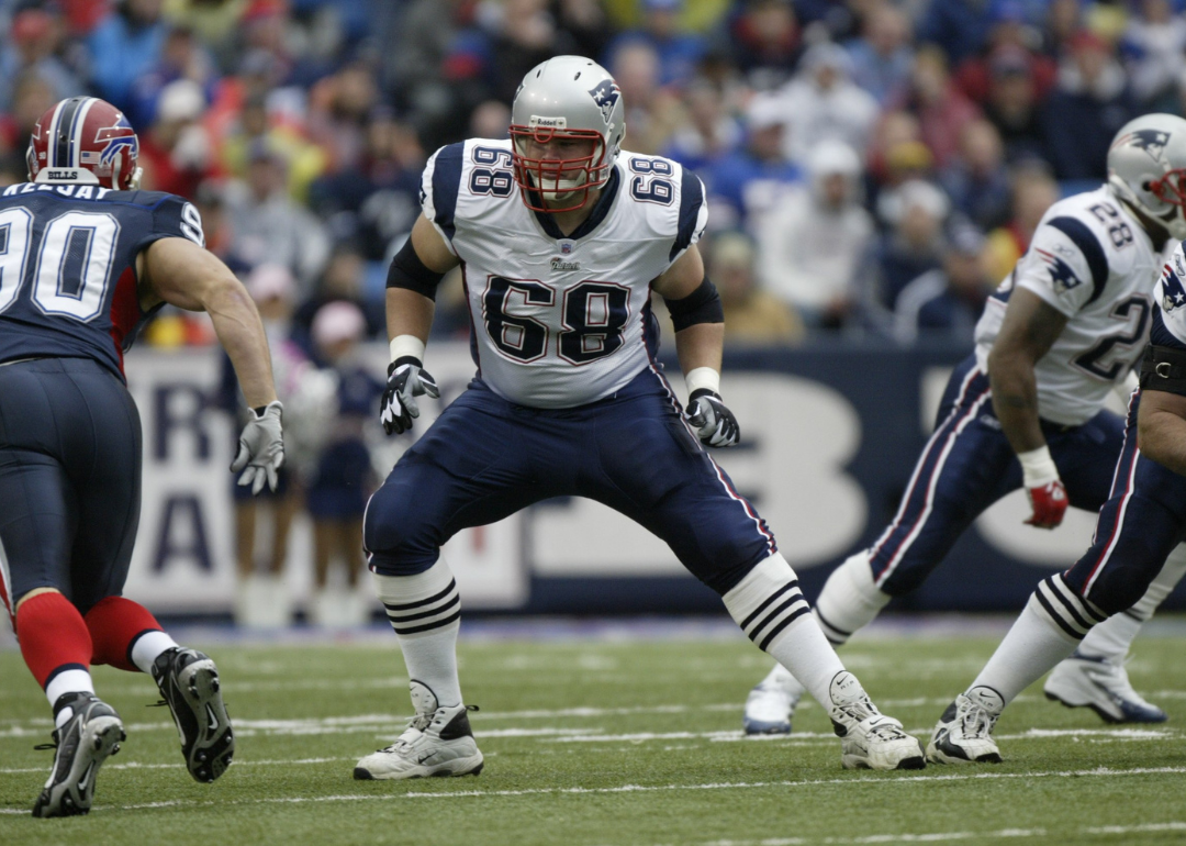 Offensive lineman Ryan O'Callaghan #68 of the New England Patriots blocking against the Buffalo Bills at Ralph Wilson Stadium on October 22, 2006, in Orchard Park, New York.