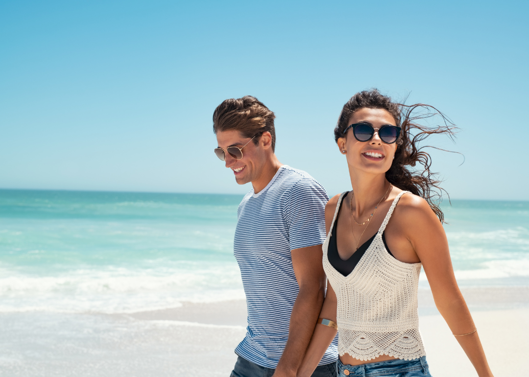 A young couple enjoying a vacation at the beach