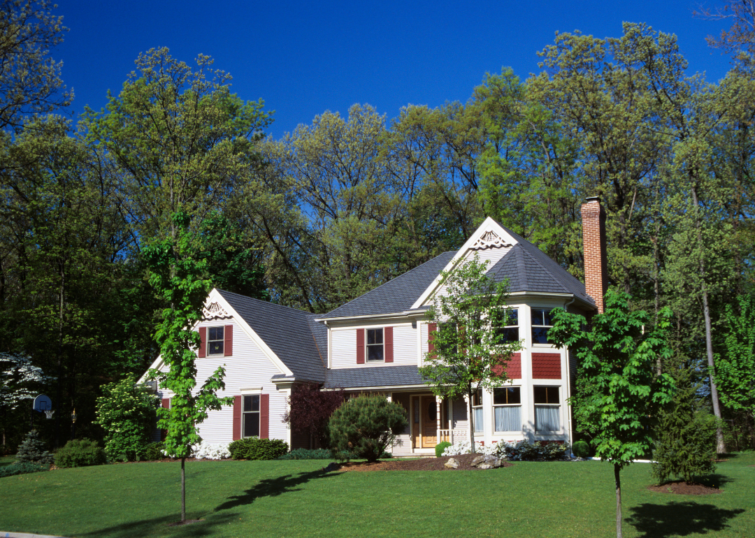 A home with maroon shutters in 1997.