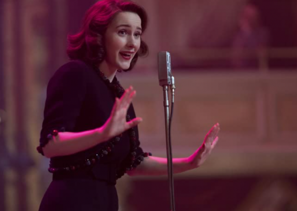 Rachel Brosnahan on stage during a scene in the TV show The Marvelous Mrs. Maisel.