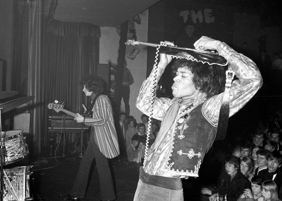 Jimi Hendrix playing his guitar.