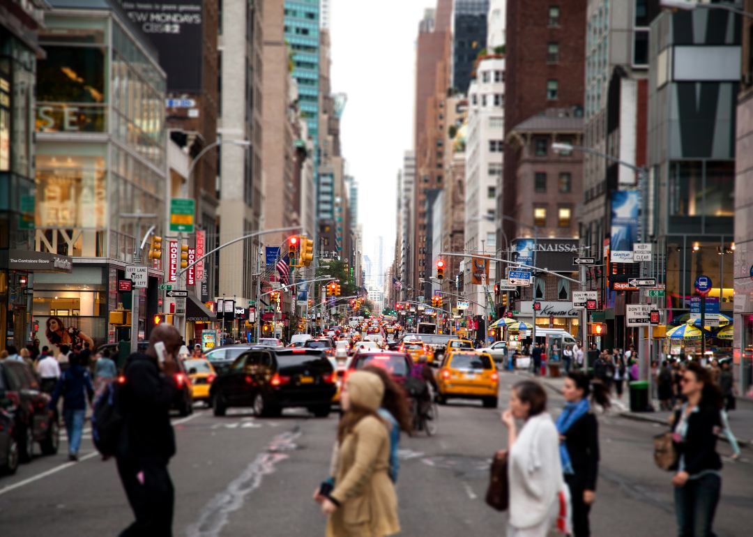 People walking at street-level in New York City.