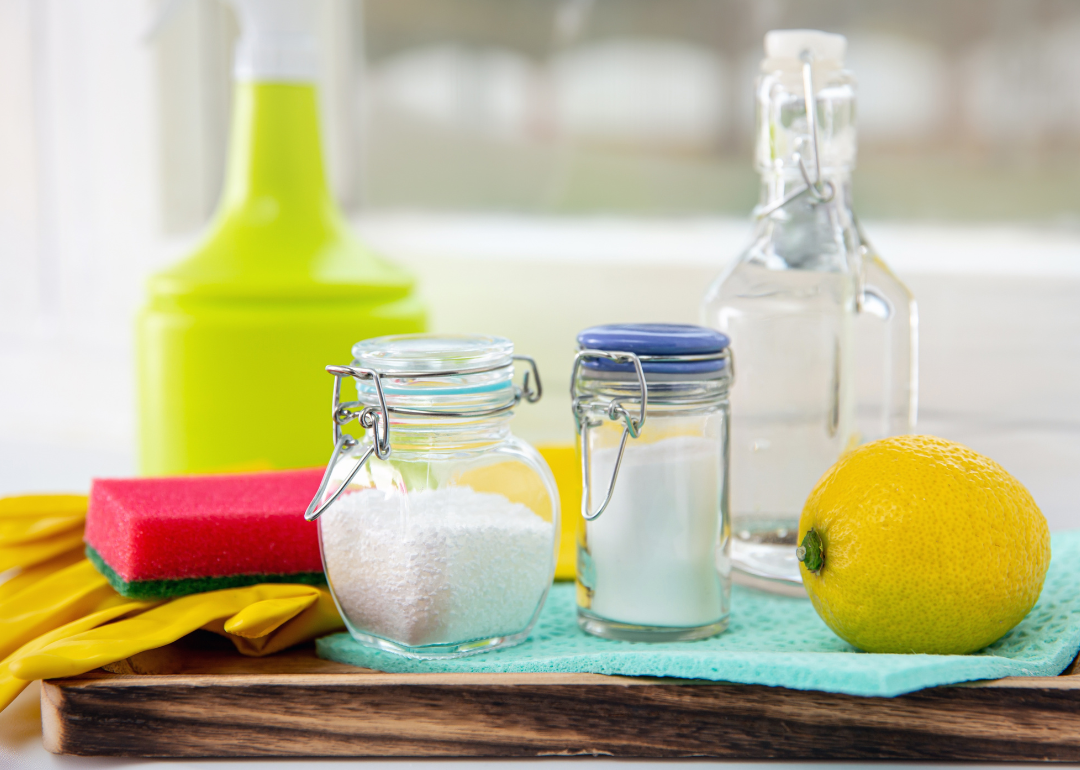 Borax powder and a lemon on a kitchen table.