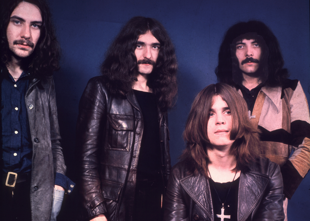 The members of Black Sabbath posing.