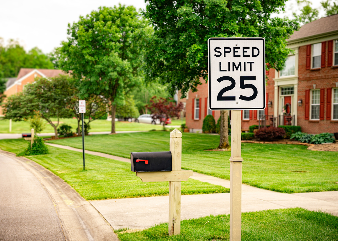 Homes along a residential road with a speed limit of 25 mph.