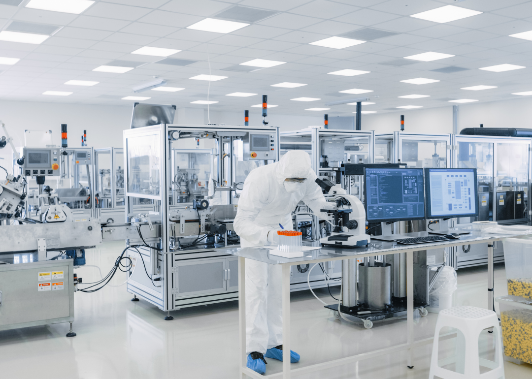 A person working in a pharmaceutical manufacturing laboratory