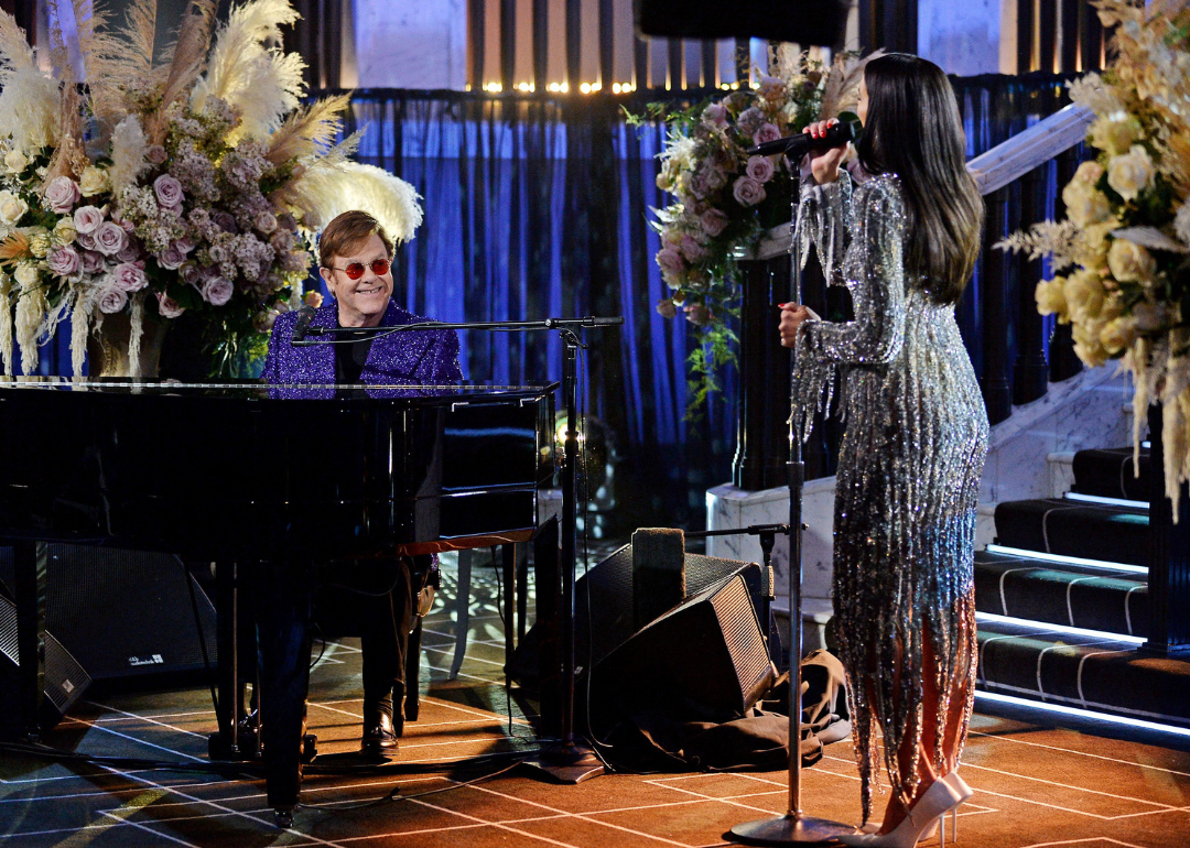Elton John and Dua Lipa performing during the 29th Annual Elton John AIDS Foundation Academy Awards Viewing Party on April 25, 2021.