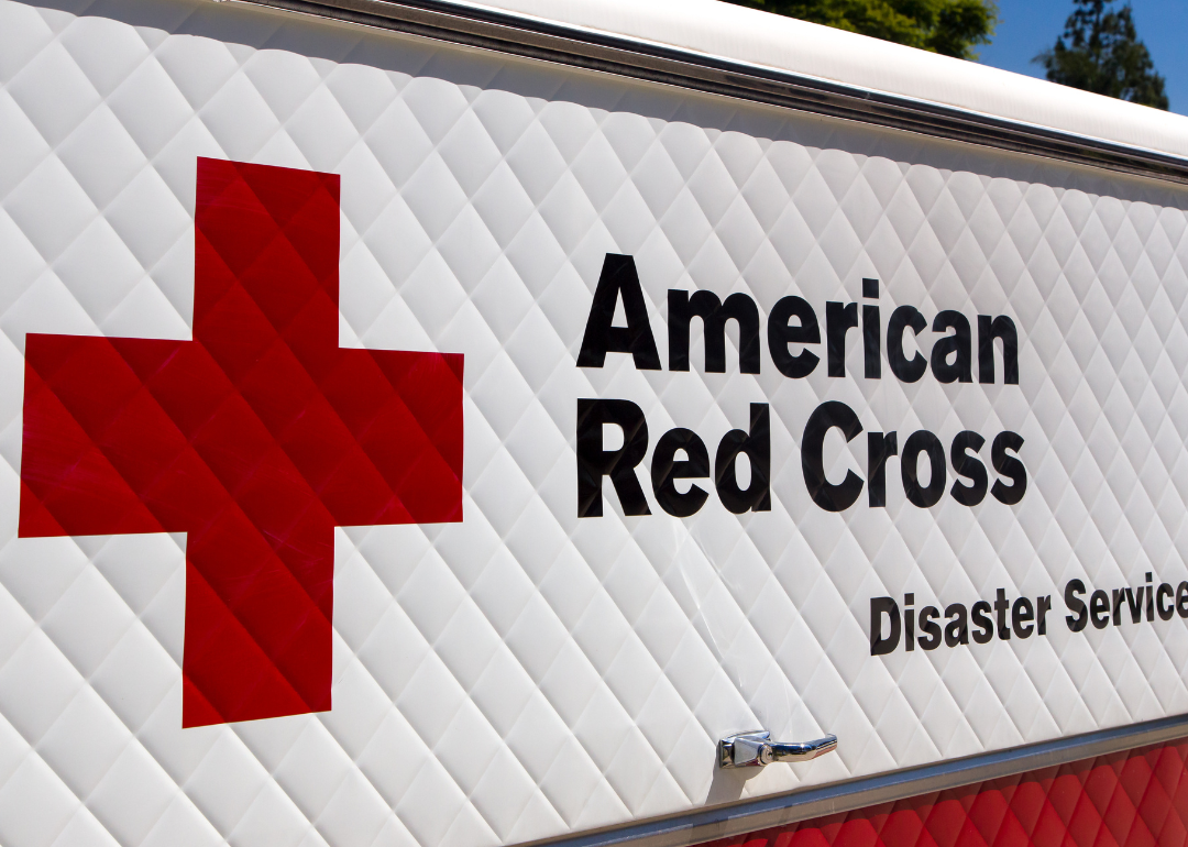 An American Red Cross Disaster Services vehicle and logo.