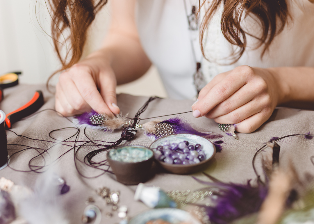 Craft artist works on a piece of jewelry