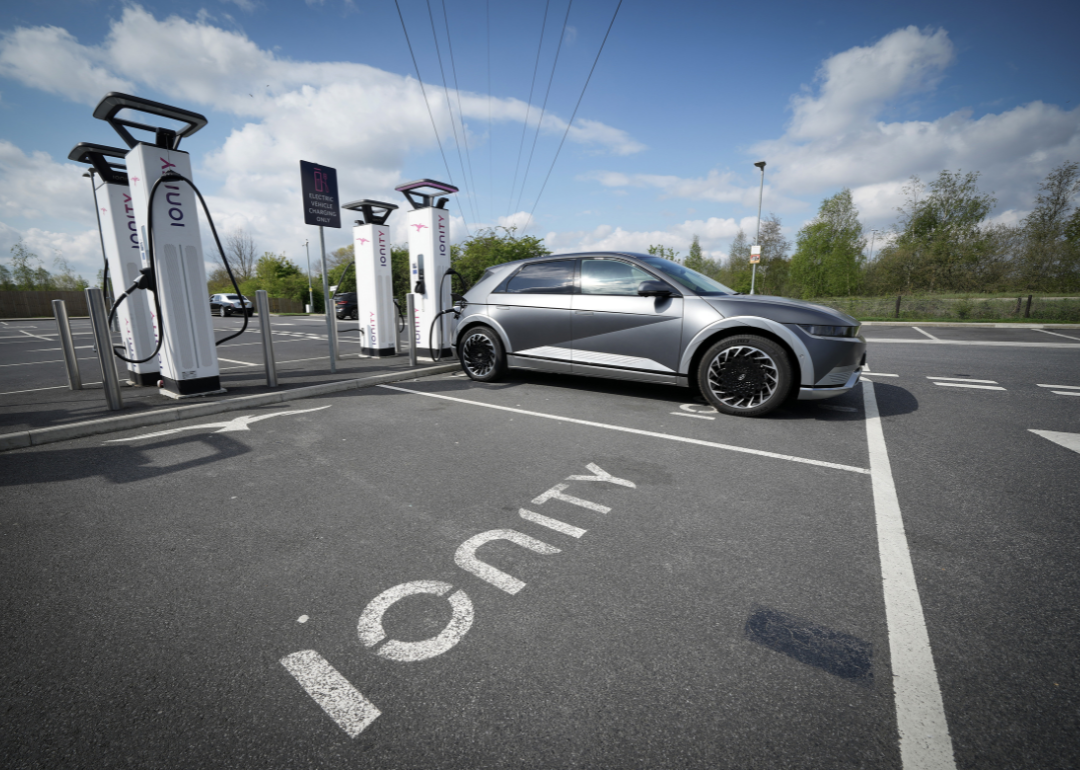 A Hyundai Ioniq battery electric vehicle (BEV) charging at an Ionity GmbH electric car charging station at Skelton Lake motorway service area on April 26, 2022, in Leeds, England.